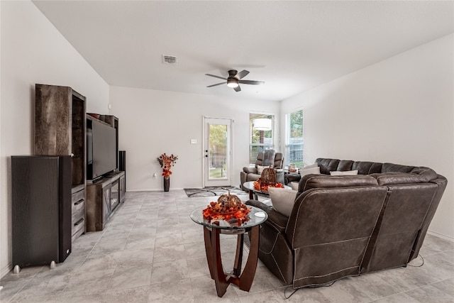 living room featuring ceiling fan