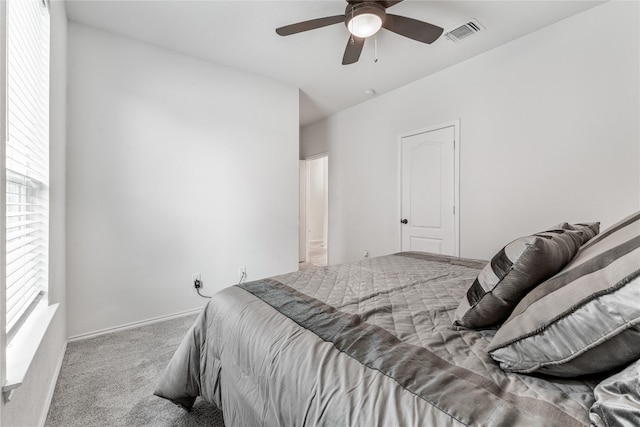 bedroom featuring ceiling fan and carpet floors