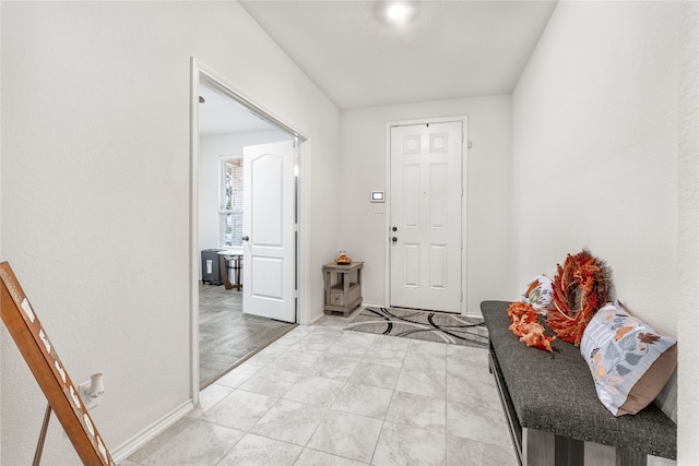 entrance foyer featuring light parquet floors