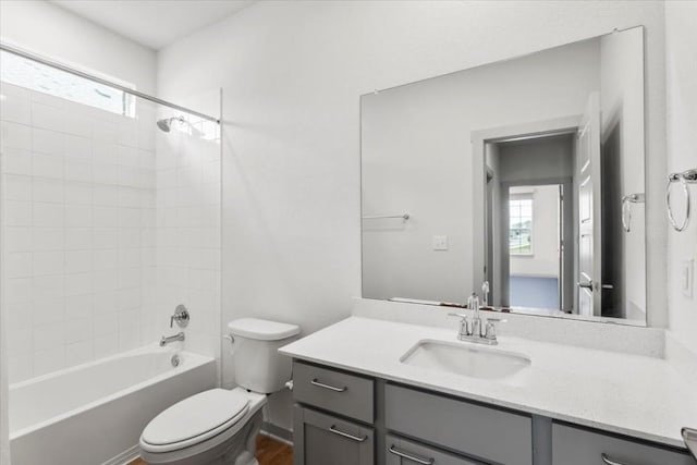 13825 Mc Arthur Dr, Manor, TX 78653 - full bath featuring vanity, bathing tub / shower combination, and wood finished floors