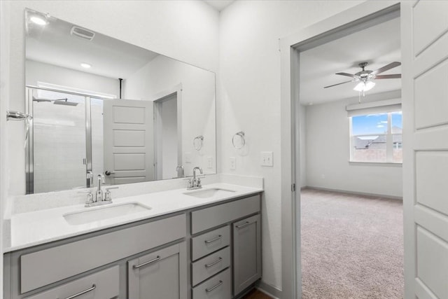 13825 Mc Arthur Dr, Manor, TX 78653 - full bathroom featuring double vanity, a stall shower, and ceiling fan