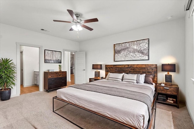 13825 Mc Arthur Dr, Manor, TX 78653 - bedroom featuring light carpet, a ceiling fan, and connected bathroom