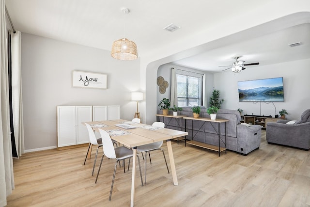 dining room featuring light wood-type flooring and ceiling fan