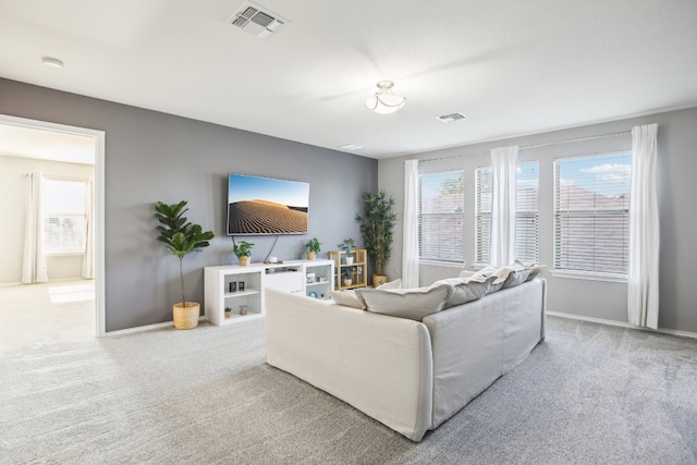 living room featuring light colored carpet