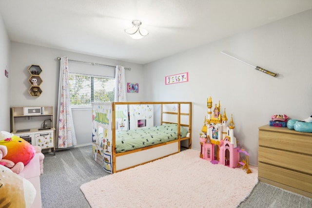 bedroom with dark colored carpet