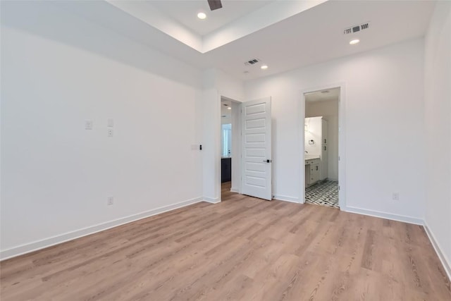 407 Meadowlark St, Austin, TX 78734 - unfurnished bedroom featuring light wood-style flooring, ensuite bathroom, recessed lighting, and ceiling fan