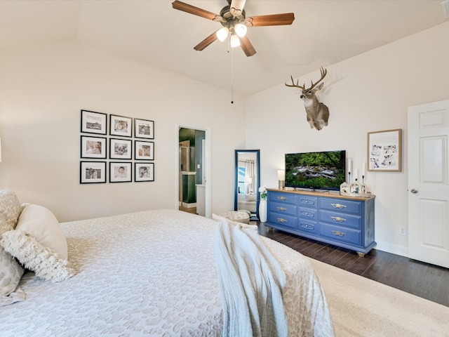 bedroom with vaulted ceiling, ceiling fan, and dark hardwood / wood-style flooring