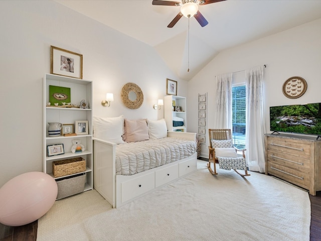 bedroom with hardwood / wood-style floors, vaulted ceiling, and ceiling fan