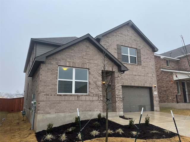 view of side of home with a garage