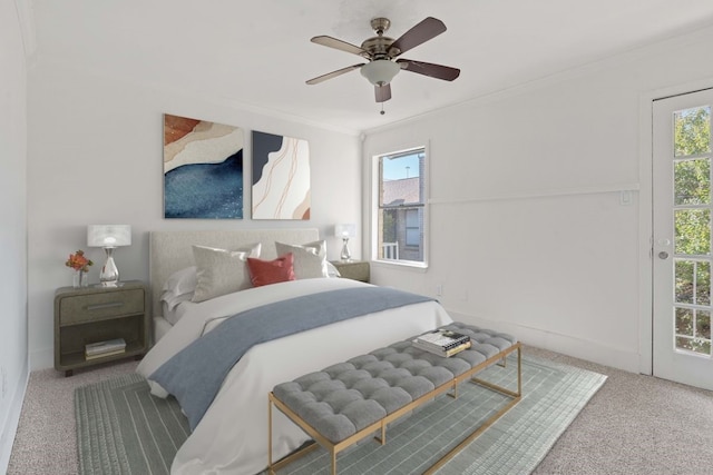 bedroom featuring ceiling fan, crown molding, and carpet floors