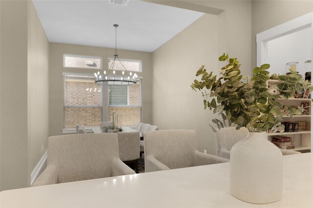 dining room with a chandelier