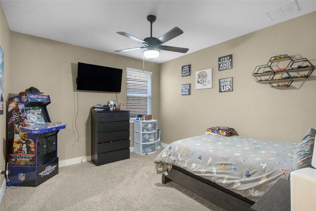 bedroom featuring ceiling fan and carpet floors