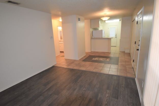 unfurnished room with light hardwood / wood-style flooring