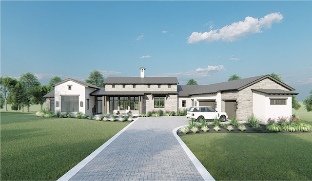 view of front of property featuring a garage and a front yard