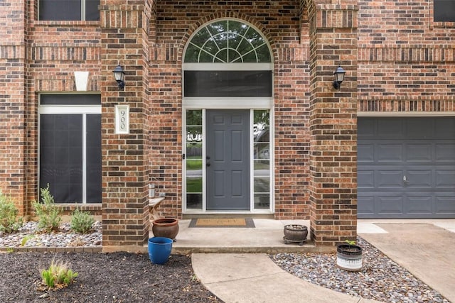 900 Laurel Cv, Buda, TX 78610 - entrance to property with brick siding and a garage