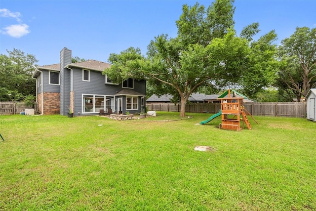 900 Laurel Cv, Buda, TX 78610 - view of yard featuring a playground