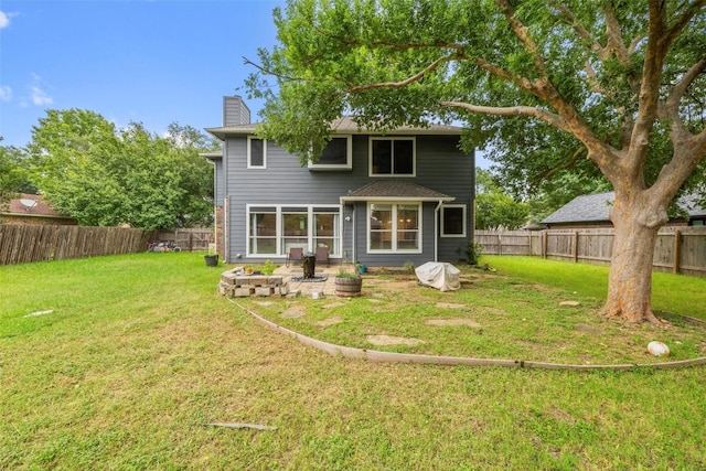 900 Laurel Cv, Buda, TX 78610 - rear view of house featuring a chimney and a patio