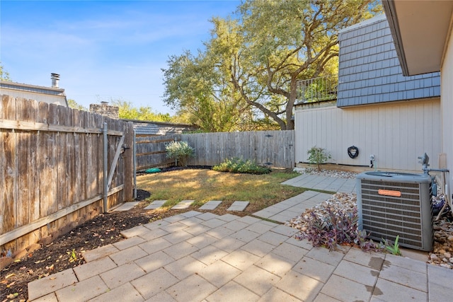 view of patio with central AC