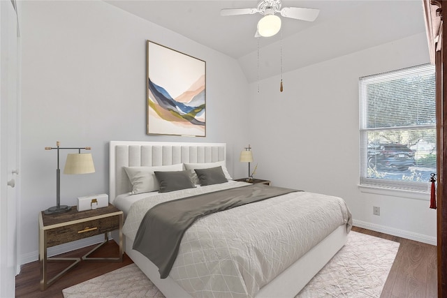 bedroom with hardwood / wood-style floors and ceiling fan