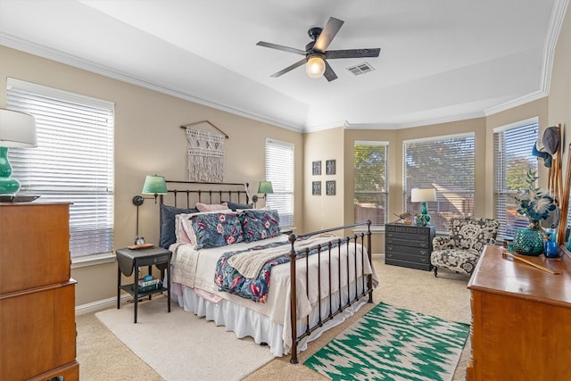 bedroom featuring light colored carpet, ceiling fan, and ornamental molding