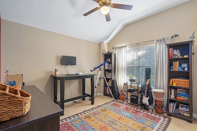 office featuring light colored carpet, vaulted ceiling, and ceiling fan