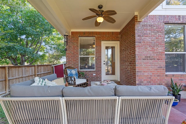 view of patio featuring ceiling fan and an outdoor living space