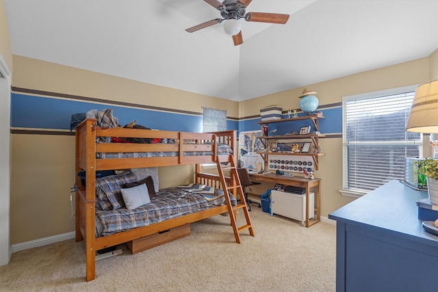 bedroom with ceiling fan and light colored carpet