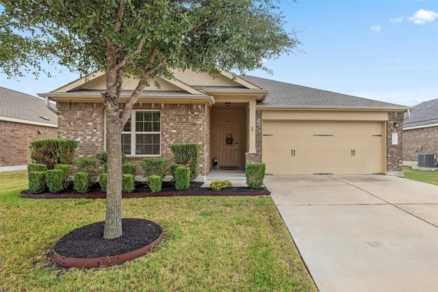 ranch-style home featuring a garage, central AC, and a front yard