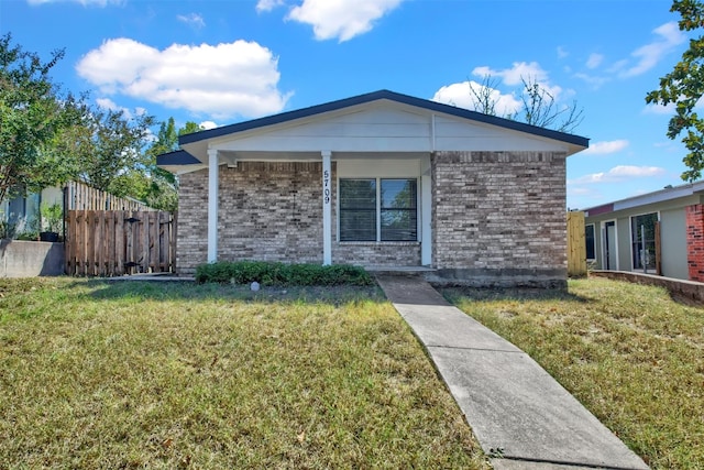 view of front facade with a front yard