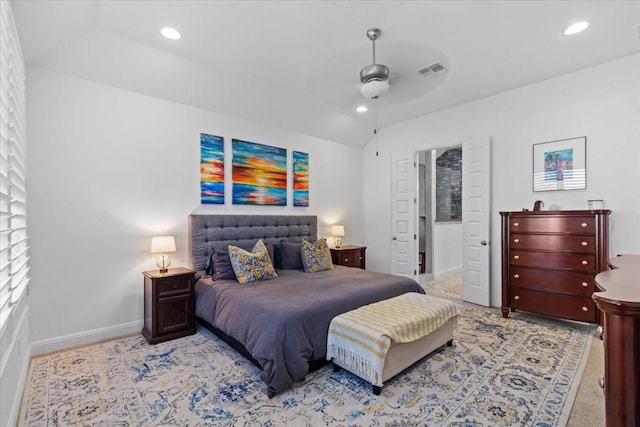 bedroom featuring ceiling fan and vaulted ceiling