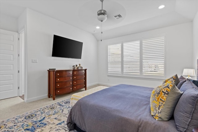 bedroom featuring ceiling fan, light colored carpet, and lofted ceiling