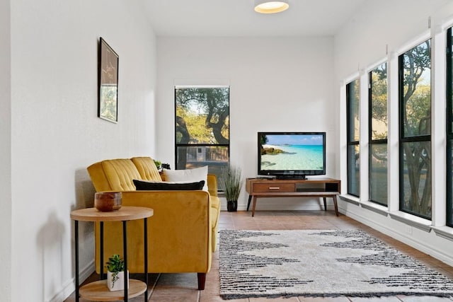 living area with light tile patterned floors