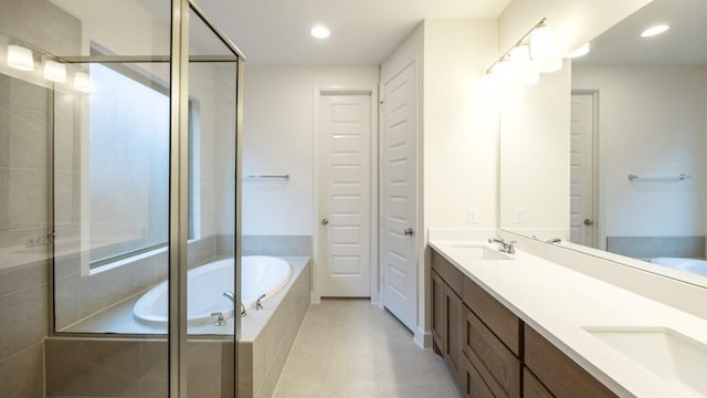 bathroom with vanity and plus walk in shower