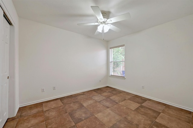 unfurnished room featuring ceiling fan