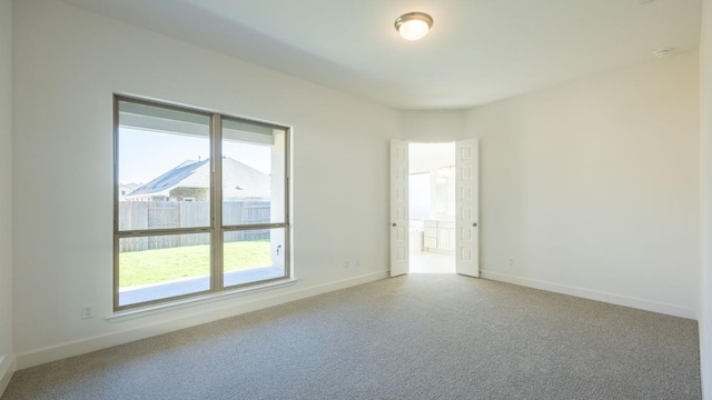 spare room featuring a wealth of natural light