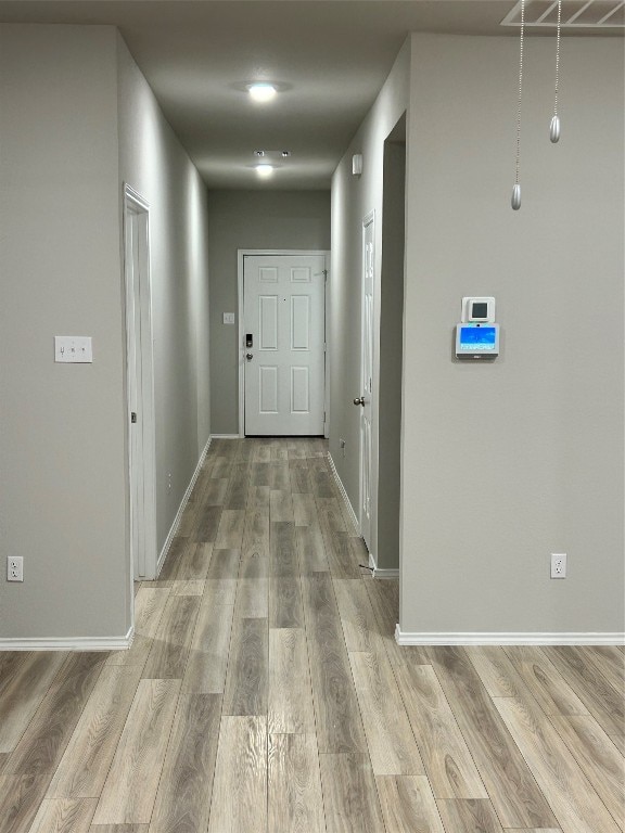 hall featuring hardwood / wood-style flooring