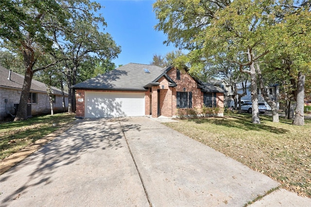 view of front facade featuring a garage and a front lawn