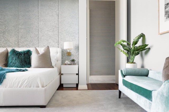 bedroom with wood-type flooring