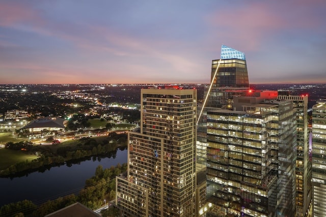 property's view of city with a water view