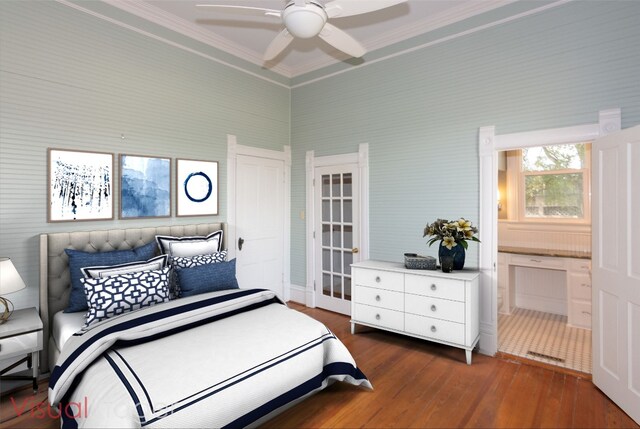 bedroom with crown molding, a ceiling fan, dark wood-type flooring, and ensuite bathroom