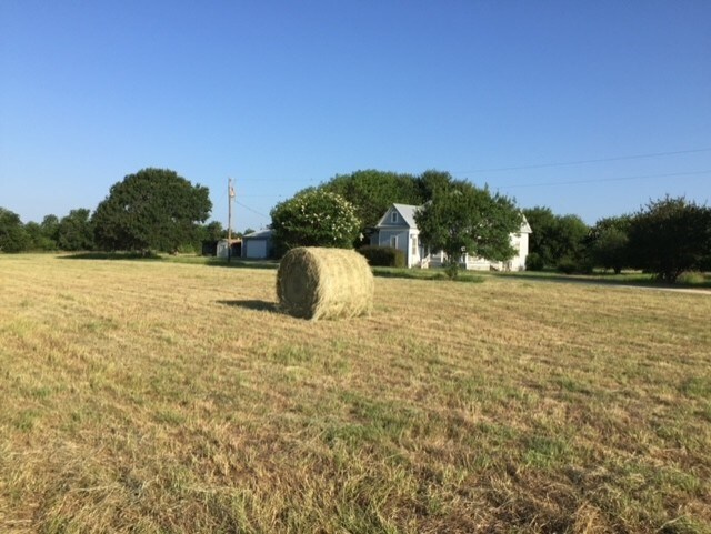 view of yard with a rural view