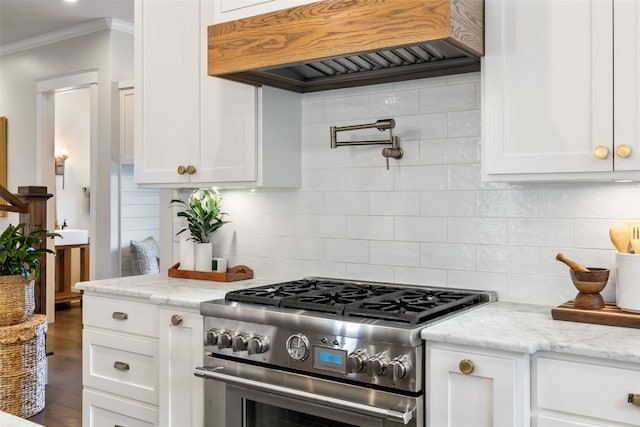 kitchen featuring white cabinetry, dark wood-type flooring, backsplash, high end range, and custom range hood