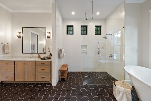 bathroom featuring plus walk in shower, vanity, and crown molding