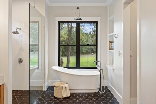 bathroom featuring separate shower and tub, crown molding, and a healthy amount of sunlight