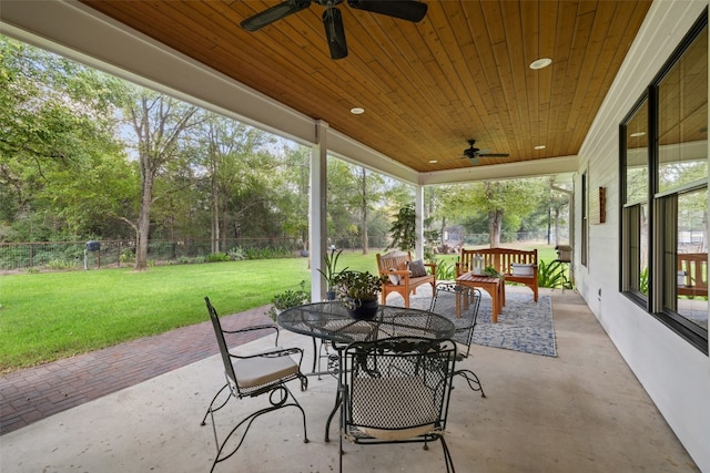 view of patio featuring ceiling fan