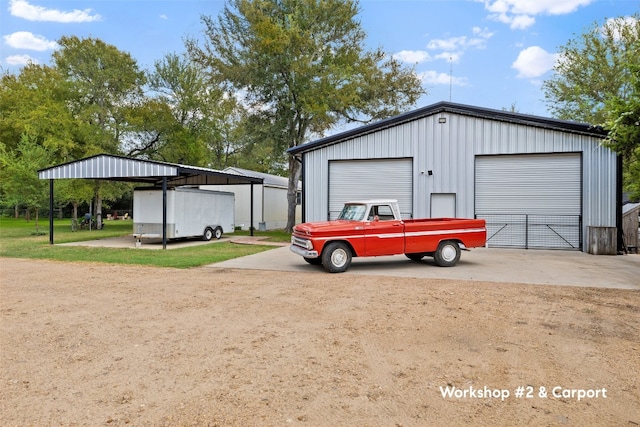 garage featuring a carport