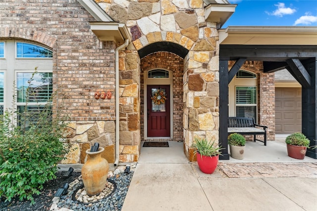 property entrance with a garage