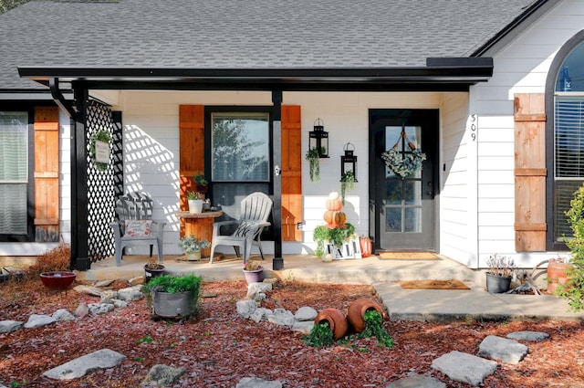 doorway to property with a porch