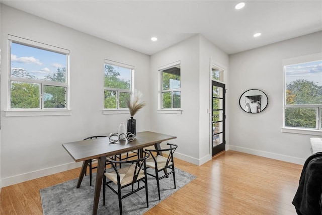 1310 S 1st St Unit 300, Austin, TX 78704 - dining space with light wood-type flooring and recessed lighting