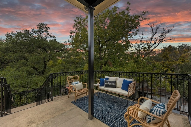 patio terrace at dusk with an outdoor living space